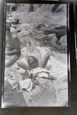 #ad 1940s beach scene blonde woman in swimsuit sunbathing Vtg b w film NEGATIVE Wc $9.99