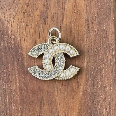 #ad Chanel Gold Crystal and Pearl Charm ; 25mm $20.00