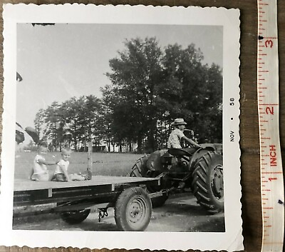 #ad Vintage 1958 Black and White Photo Man Riding Tractor Kids On Trailer 3.5”x3.5” $8.00